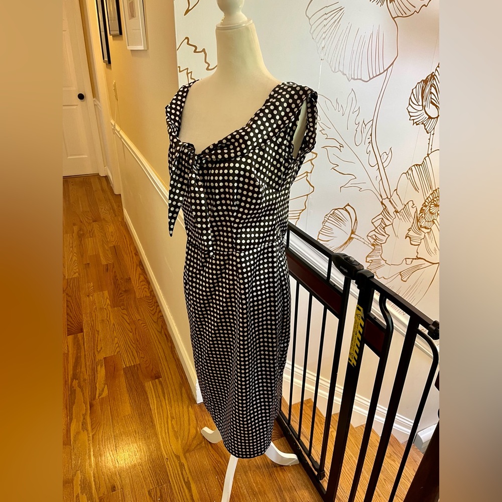 Black wiggle dress with white polka dots made by Lucky 13 clothing, size XL